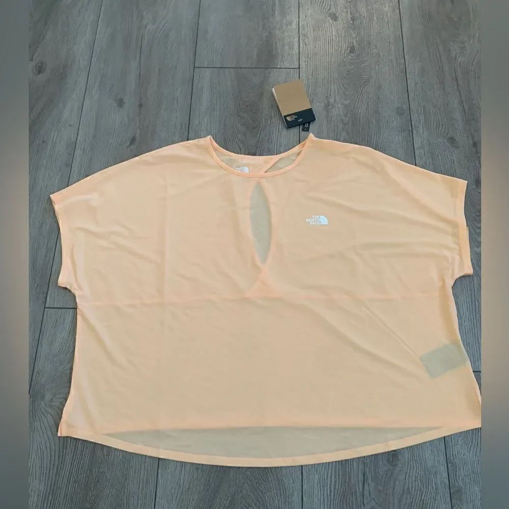 The North Face woman’s top with Im opening on the back very light and fresh